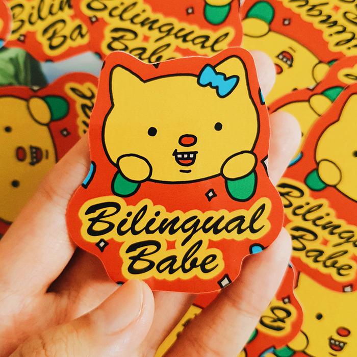 Bilingual Babe Sticker – Wormhole